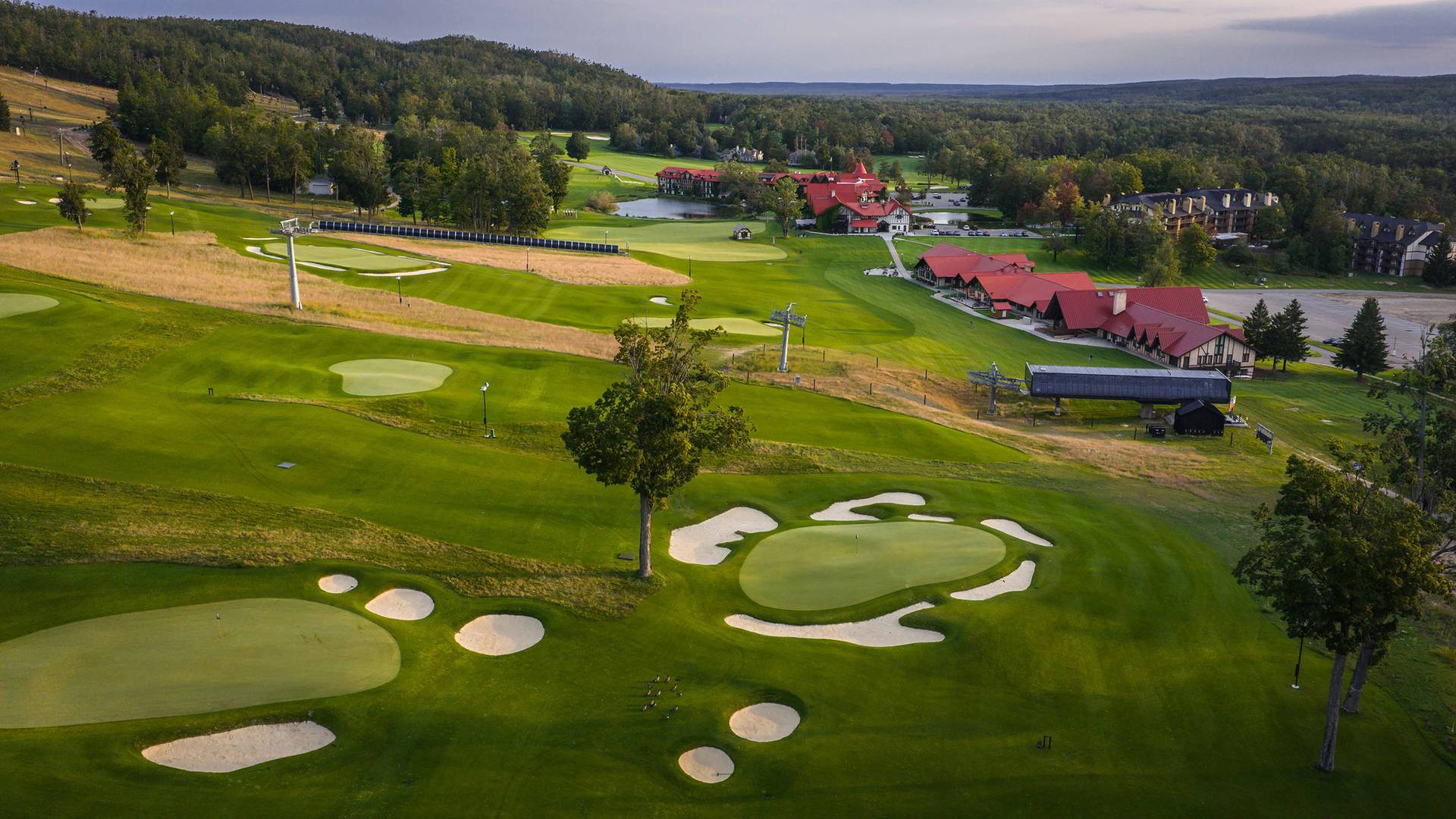 Drone shot of Doon Brae during sunsire on Holes 2-4