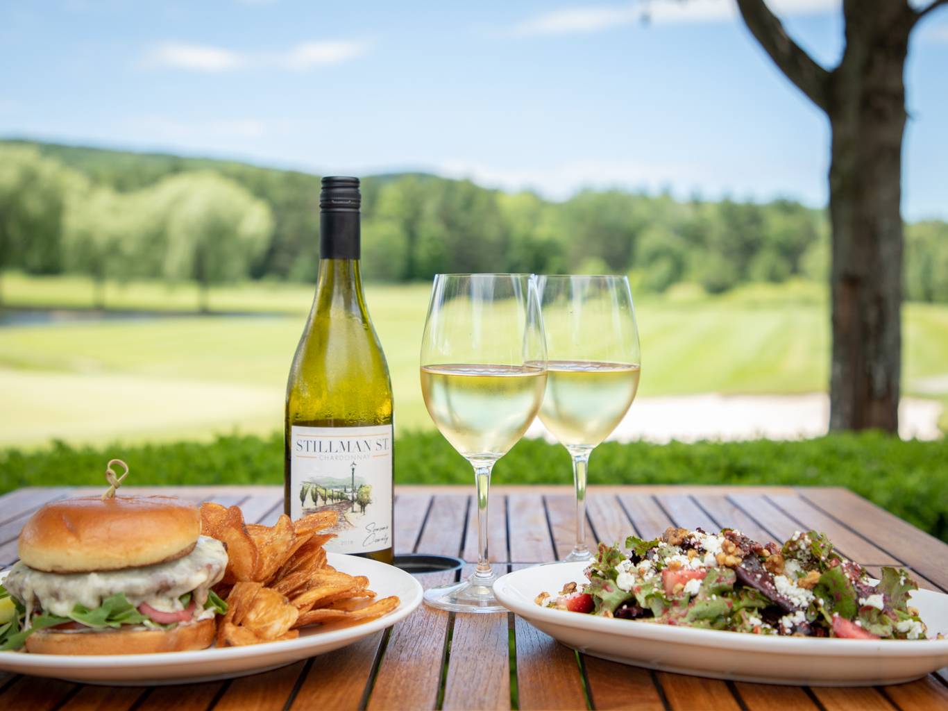 A burger and salad at Seminole Pub at Country Club of Boyne