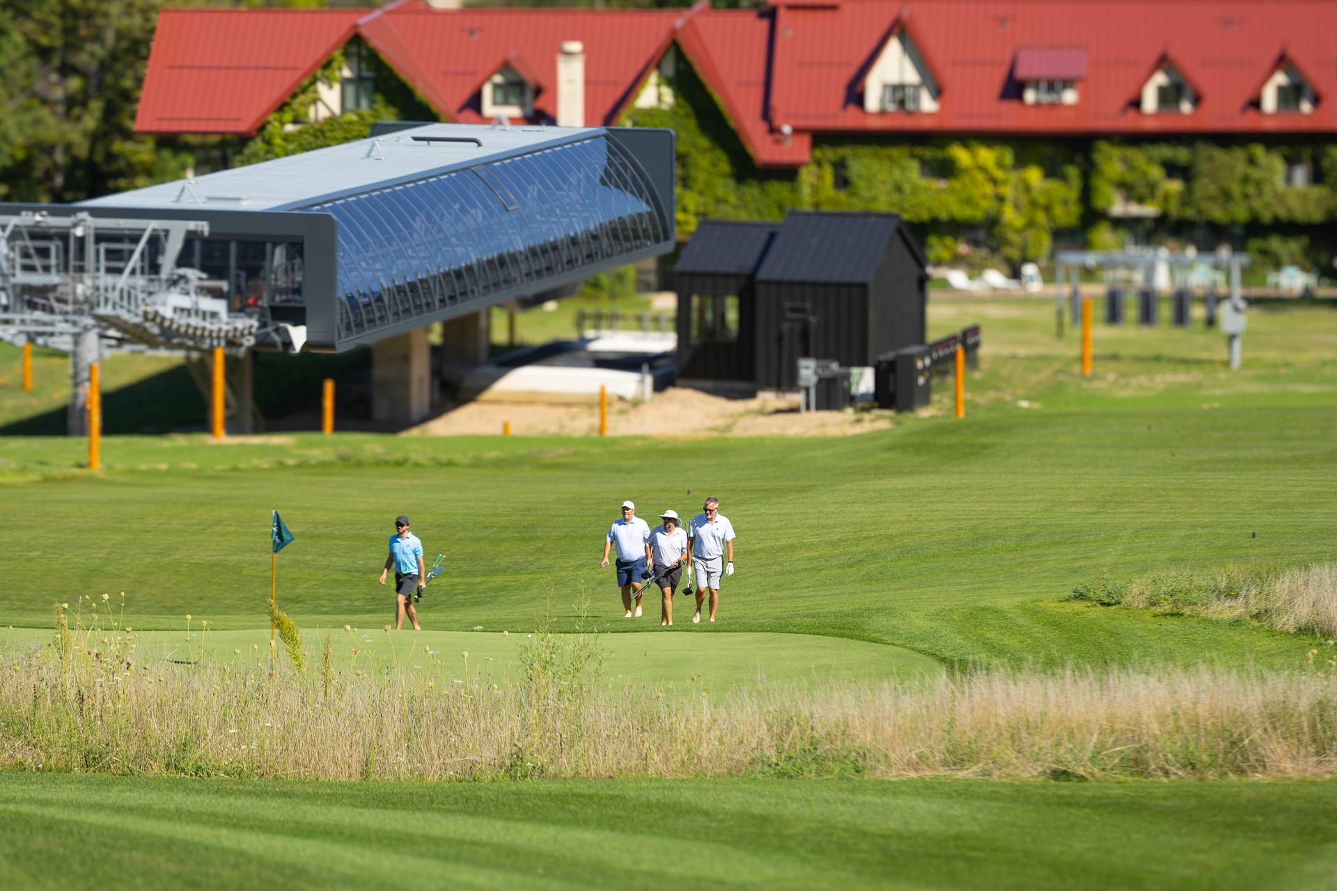 A group of golfers on Doon Brae near the Camelot 6 chairlift